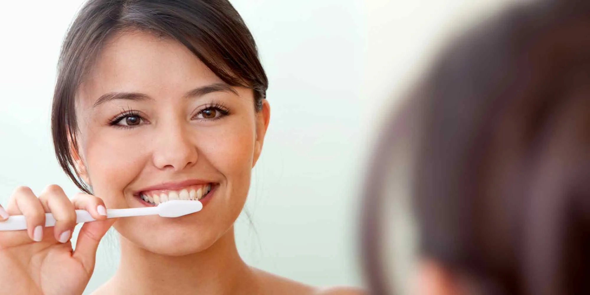 Dental Waukesha WI Hillcrest Family Dental Woman Brushing Teeth Dental Waukesha WI Hillcrest Family Dental Woman Brushing Teeth